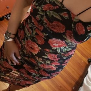 Floral dress with sheer bottom.